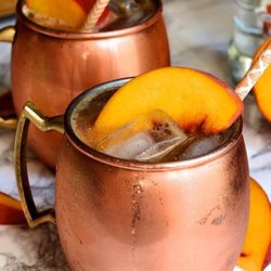 The Hammered Copper - Ginger Peach Mule! Check out our blog for the recipe!