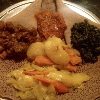 E'Njoni Cafe - vegan sampler for one with 5 different dishes. so good! - Ethiopian Near Me - Portland, Oregon E'Njoni Cafe - vegan sampler for one with 5 different dishes. so good! - Ethiopian Near Me - Portland, Oregon