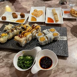 Veggie tempura, spring rolls, cheese rangoons. Nissan and mini cooper roll and spicy yellow tail roll. Spicy chili oil from the sauce bar Veggie tempura, spring rolls, cheese rangoons. Nissan and mini cooper roll and spicy yellow tail roll. Spicy chili oil from the sauce bar