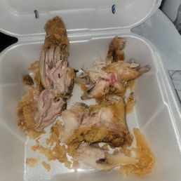 A 3 piece of raw chicken. Body and sliimely..