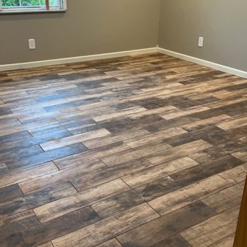 Pearce Custom Renovations  - a hardwood floor in a home - Flooring Near Me