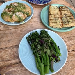 Garlic bread, fried Crispy Potatoes and Charred Broccolini Garlic bread, fried Crispy Potatoes and Charred Broccolini