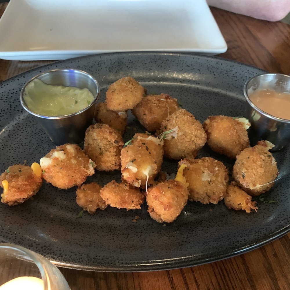 Palette Bar & Grill - Cheese curds with cilantro-garlic aioli sauce and secret sauce - Cocktail Bars Near Me - Madison, Wisconsin Palette Bar & Grill - Cheese curds with cilantro-garlic aioli sauce and secret sauce - Cocktail Bars Near Me - Madison, Wisconsin
