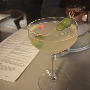Peridot - Such a unique cocktail! vernazza italicus, roku gin, prosecco, lemon, thai basil, castelvetrano olives (aromatic, citrus, effervescent) - Vietnamese Near Me - Ann Arbor, Michigan