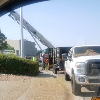 TreePros - You can see the wood particle blown all over due to the lack of cover that should be on the chipper to prevent this, unprofessional. - Tree Services Near Me - Albuquerque, New Mexico