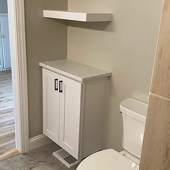 ATM Home Renovations - bathroom with a toilet and cabinets - General Contractors Near Me ATM Home Renovations - bathroom with a toilet and cabinets - General Contractors Near Me