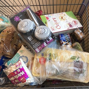 ALDI - salad is under the big package of chicken. Bread on top of each other w/ shower head on top. - Organic Stores Near Me - Whittier, California