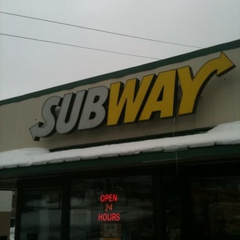 Subway - a subway sign on the side of a building - Sandwiches Near Me - St Paul, Minnesota