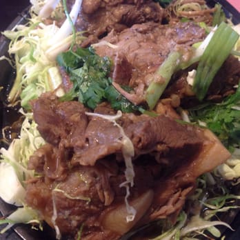 Panya Thai Kitchen - Thai ribs on sizzling plate.... My son was looking more for "ribs" but he loved these!!! - Thai Near Me - Escondido, California Panya Thai Kitchen - Thai ribs on sizzling plate.... My son was looking more for "ribs" but he loved these!!! - Thai Near Me - Escondido, California