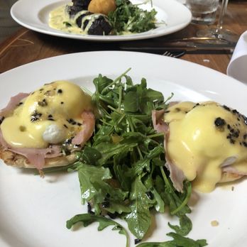 Eleven - Eggs Benedict with Steak & Egg in back - New American Near Me - Pittsburgh, Pennsylvania