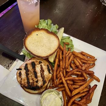 Big Chicks - Salmon Burger, salty dog cocktail - Gay Bars Near Me - Chicago, Illinois