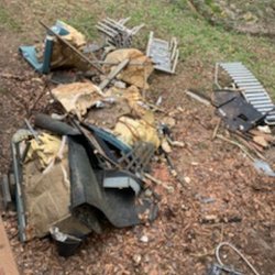 The Junkluggers of Williamsburg - Hauling away back yard debris and junk in Williamsburg, VA.
