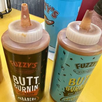 Fuzzy's Taco Shop - These containers have so much dry, crusty sauce on the lids. - Mexican Near Me - Webster Groves, Missouri Fuzzy's Taco Shop - These containers have so much dry, crusty sauce on the lids. - Mexican Near Me - Webster Groves, Missouri