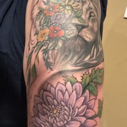 Lion with beautiful flowers
