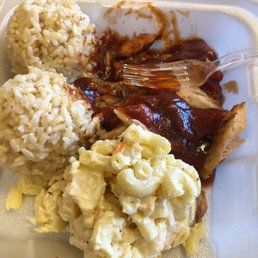 a meal of rice, meat, and macaroni and cheese