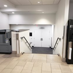 Northbrook Public Library - Entrance to the auditorium. Lift with an open-top on the left side.