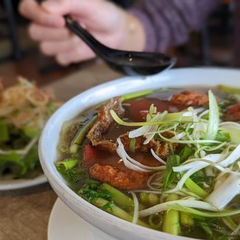 Pho Anh Vu - a bowl of soup and a plate of noodles - Vietnamese Near Me - Toronto, Ontario Pho Anh Vu - a bowl of soup and a plate of noodles - Vietnamese Near Me - Toronto, Ontario