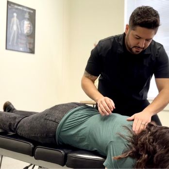 By Design Chiropractic - This is a pic of me getting adjusted by Dr. Martinez - Chiropractors Near Me - Farmers Branch, Texas By Design Chiropractic - This is a pic of me getting adjusted by Dr. Martinez - Chiropractors Near Me - Farmers Branch, Texas