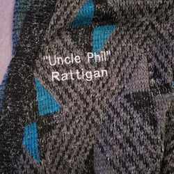 Diane's Designs & All Stiches - Stitched on a loose knit sweater and still very clear and readable. Great price as well