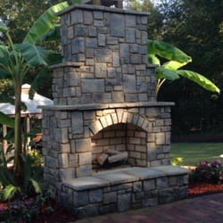 Artisan Professional Design Co. - Exterior all masonry cultured stone fireplace