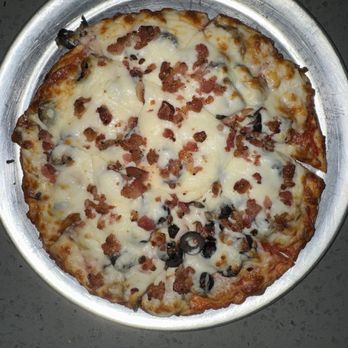 Dell's Pizza - Personal pizza: bacon, black olives, and pepperoni - Pizza Near Me - Casa Grande, Arizona