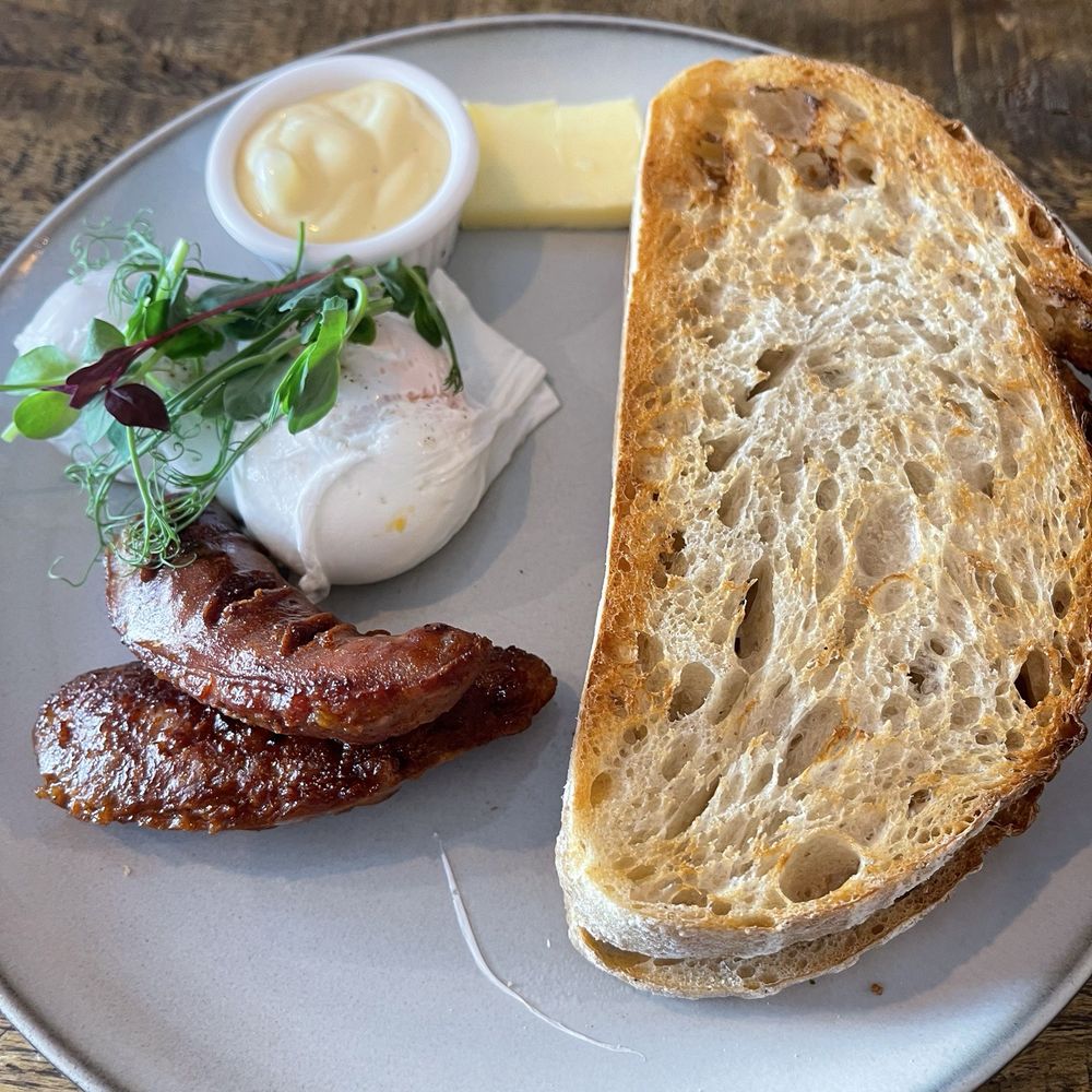 Bonjour Brioche - Beniccio Eggs ( substituted sourdough toast instead of brioche) chorizo sausage - Cafes Near Me - London, XGL Bonjour Brioche - Beniccio Eggs ( substituted sourdough toast instead of brioche) chorizo sausage - Cafes Near Me - London, XGL