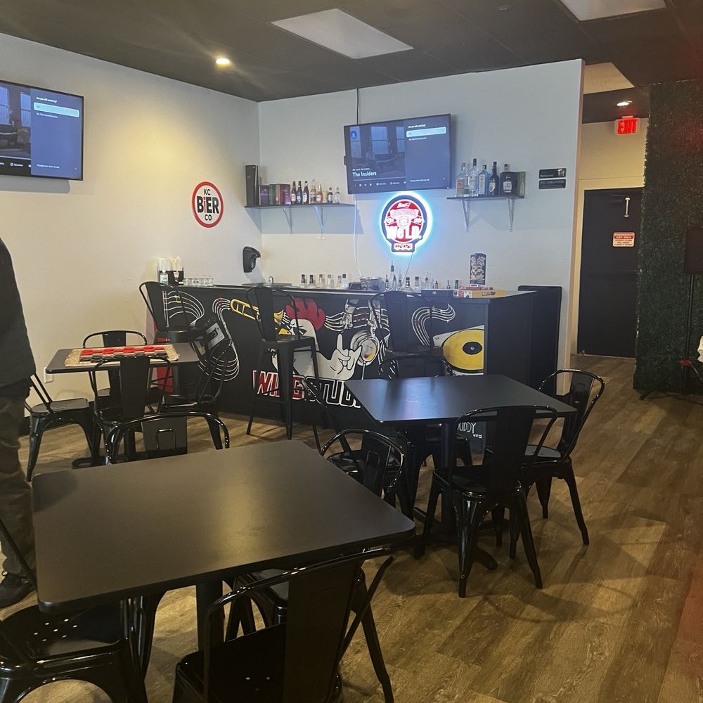 Wing Studio - Bar/ seating area - Chicken Wings Near Me - Lee's Summit, Missouri Wing Studio - Bar/ seating area - Chicken Wings Near Me - Lee's Summit, Missouri