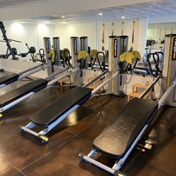 The Fit Mill - Our Gravity Training System (GTS) is like a Pilates reformer on steroids! This versatile system is optimized for building strength.
