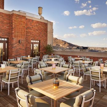 La Perla - a patio with tables and chairs - Bars Near Me - El Paso, Texas La Perla - a patio with tables and chairs - Bars Near Me - El Paso, Texas