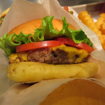 Shake Shack Buckhead - ShackBurger - cheeseburger topped with lettuce, tomato, and ShackSauce. - Burgers Near Me - Atlanta, Georgia Shake Shack Buckhead - ShackBurger - cheeseburger topped with lettuce, tomato, and ShackSauce. - Burgers Near Me - Atlanta, Georgia
