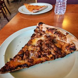 Frank's Pizza and Italian Restaurant - I ordered a BBQ Chicken slice. They burned it.