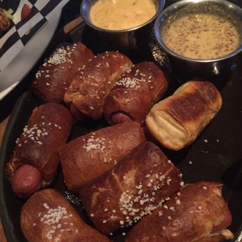 The Mucky Duck Bar - Pigs in a Blanket with Queso and Spicy Mustard - Pubs Near Me - Addison, Texas