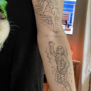 Cygni Tattoo - uncolored tattoo of the creature and damsel - Tattoo Near Me - Tacoma, Washington Cygni Tattoo - uncolored tattoo of the creature and damsel - Tattoo Near Me - Tacoma, Washington