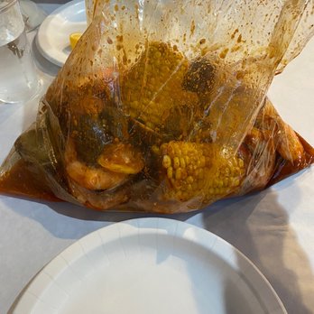Claw Shack - Combination of 1 lb shrimp and 1 lb mussel in shambalang sauce - Cajun/Creole Near Me - San Jose, California Claw Shack - Combination of 1 lb shrimp and 1 lb mussel in shambalang sauce - Cajun/Creole Near Me - San Jose, California