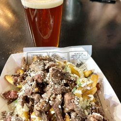A Toda Madre - Asada fríes @New District Brewery