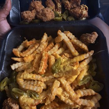 Dave's Hot Chicken - Large nacho fries. Supposed to have extra cheese and jalapeños to the side. As you can see it's the opposite. - Chicken Shop Near Me - Dallas, Texas Dave's Hot Chicken - Large nacho fries. Supposed to have extra cheese and jalapeños to the side. As you can see it's the opposite. - Chicken Shop Near Me - Dallas, Texas