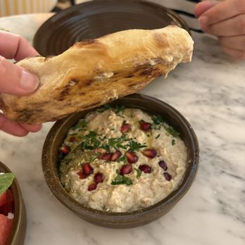 Motek - Flatiron - Happy hour dip. The pomegranate did nothing to dish and there was not enough pita so we had half a plate of dip. - Mediterranean Near Me - New York, New York Motek - Flatiron - Happy hour dip. The pomegranate did nothing to dish and there was not enough pita so we had half a plate of dip. - Mediterranean Near Me - New York, New York