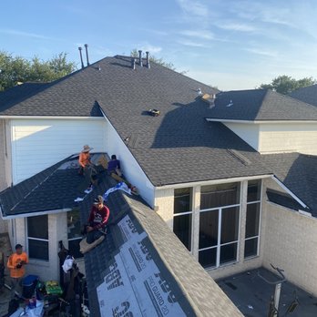 Redfish Roofing Company - Looking from on top of my garage. The Redfish roofers getting it done! - Roofing Near Me - Houston, Texas Redfish Roofing Company - Looking from on top of my garage. The Redfish roofers getting it done! - Roofing Near Me - Houston, Texas