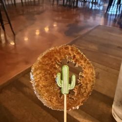 Top shelf margarita with a burnt sugar drink pick, made by Christina!