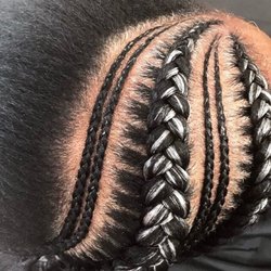 Good Mother Hair Braiding - Process of cornrows.