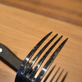 BJ's Restaurant & Brewhouse - Same food chunks on silverware. - Pizza Near Me - Cerritos, California BJ's Restaurant & Brewhouse - Same food chunks on silverware. - Pizza Near Me - Cerritos, California