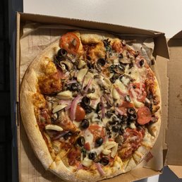 a pizza in a pizza box a pizza in a pizza box