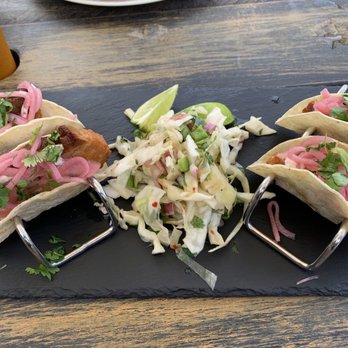 Cedar - TACO BELLY (4) Flour tortilla, crispy pork belly, avocado-lime crema, pickled red onion, cilantro, house slaw - Breakfast & Brunch Near Me - Covington, Kentucky
