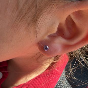 Paradigm Piercings - Her ear walking out of the shop. - Piercing Near Me - Huntington Beach, California