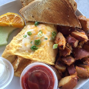 Nellie's On 90th - an omelet, potatoes, toast, and fruit - Breakfast & Brunch Near Me - Calgary, Alberta Nellie's On 90th - an omelet, potatoes, toast, and fruit - Breakfast & Brunch Near Me - Calgary, Alberta