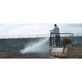 Bill's Hydroseed - a man on a platform spraying water - Landscaping Near Me - Corona, California Bill's Hydroseed - a man on a platform spraying water - Landscaping Near Me - Corona, California