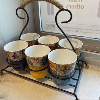 Chai Naka - a rack with six cups on it - Coffee & Tea Near Me - Brampton, Ontario Chai Naka - a rack with six cups on it - Coffee & Tea Near Me - Brampton, Ontario