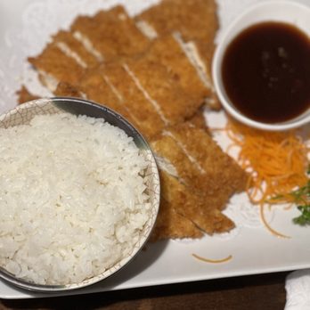 Sapporo East - a plate of rice and a bowl of sauce - Sushi Bars Near Me - Virginia Beach, Virginia Sapporo East - a plate of rice and a bowl of sauce - Sushi Bars Near Me - Virginia Beach, Virginia