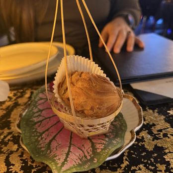 Madame Puffs and Thai Bistro - A puff in a basket - Thai Near Me - Chicago, Illinois Madame Puffs and Thai Bistro - A puff in a basket - Thai Near Me - Chicago, Illinois