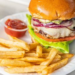 The Street Deli Truck - Cali Burger: lettuce , tomato, grilled onions, mozzarella cheese, guacamole, house aioli.( served with french fries or salad)